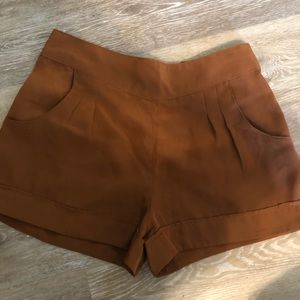 Orange high rise women’s shorts size med